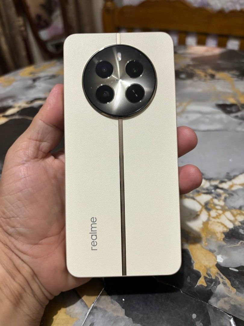 Realme 12 plus (Category: Realme) located in Orani. Submitted by t2aga (Listing ID 1449763493, Image 2). Description: - Realme 12 plus - 256gb rom, 12gb ram - Bright and clear display - complete with box and orig fast charger - Runs on Android OS - dual active sim openline - Comes with a protective case - Ideal for everyday use.
