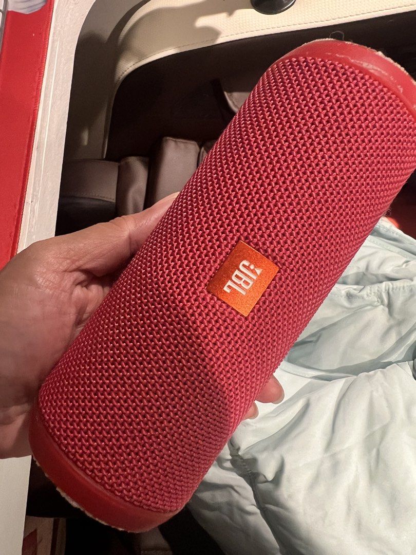 Red JBL Flip Portable Bluetooth Speaker (Category: Soundbars, Speakers & Amplifiers) located in Las Pinas. Submitted by sashimex (Listing ID 1449915937, Image 3). Description: - Red JBL Flip portable Bluetooth speaker - Cylindrical design - Shows some signs of wear around the edges/rubberized ends - Fully functional and ready for use - Ideal for music on the go.