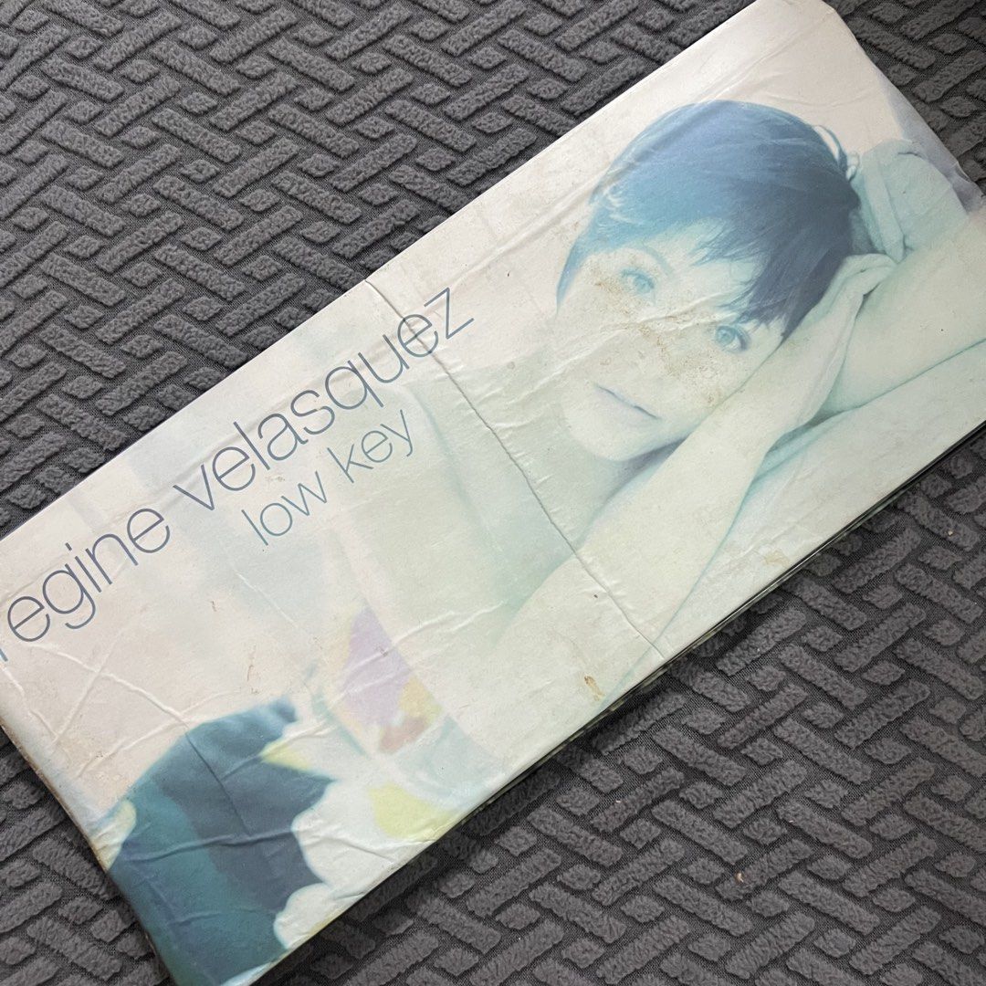 Regine Velasquez - Low Key (Category: CDs & DVDs) located in Caloocan City. Submitted by thelittlejewelcase (Listing ID 1449940616, Image 1). Description: cover and inlay has water damaged ‼️ but CDs are in excellent condition ✨.