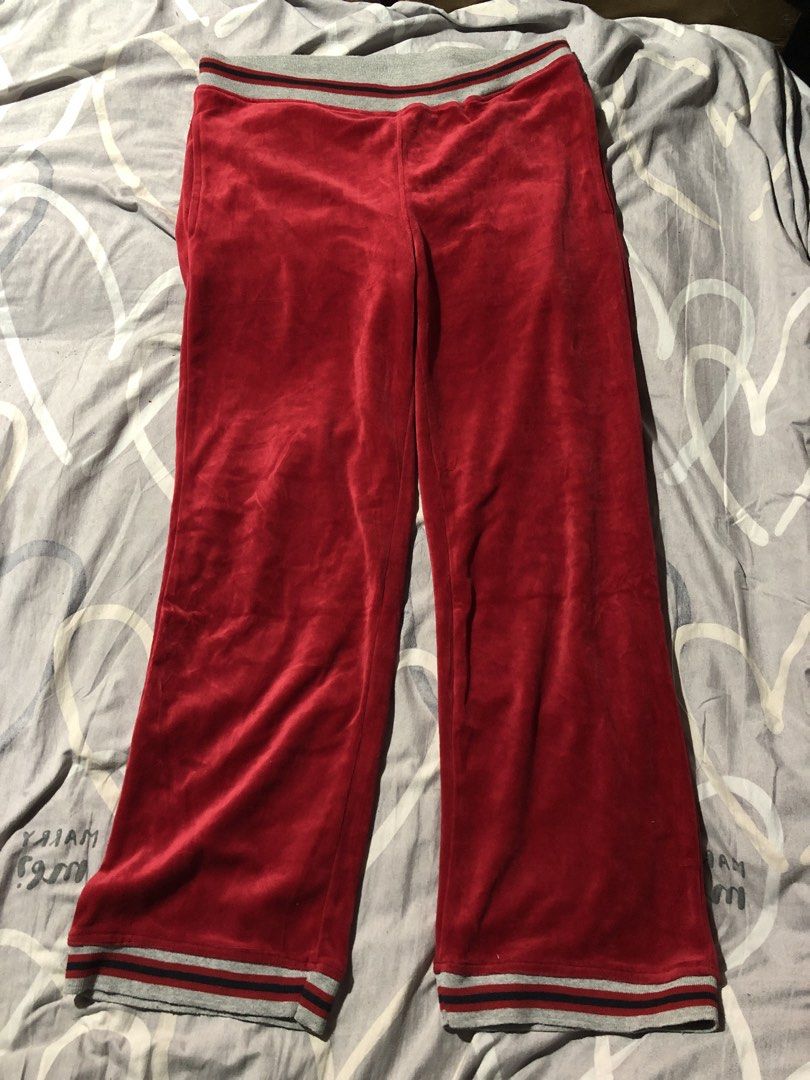 Sean John Red Velour Track Pants Size M (Category: Joggers) located in Manila. Submitted by bakithrift213 (Listing ID 1449951375, Image 1). Description: - Sean John red velour track pants - Size: Medium - Elastic waistband with drawstring - Back pocket with embroidered logo - Striped detailing at waistband and cuffs - Perfect for lounging or casual wear.