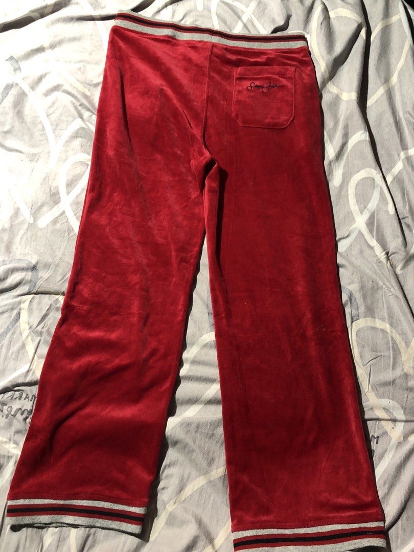 Sean John Red Velour Track Pants Size M (Category: Joggers) located in Manila. Submitted by bakithrift213 (Listing ID 1449951375, Image 2). Description: - Sean John red velour track pants - Size: Medium - Elastic waistband with drawstring - Back pocket with embroidered logo - Striped detailing at waistband and cuffs - Perfect for lounging or casual wear.