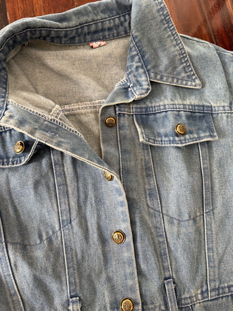 Sleeveless Denim Midi Dress with Button Front (Category: Dresses) located in Pasig City. Submitted by atbp__ (Listing ID 1449768701, Image 3). Description: - Light wash denim dress , never worn just washed - Missing belt - Sleeveless with collared neckline - Button-up front with two chest pockets - Fitted waist with belt loops - Full A-line skirt with side pockets - Raw hem detail - Ideal for casual wear.