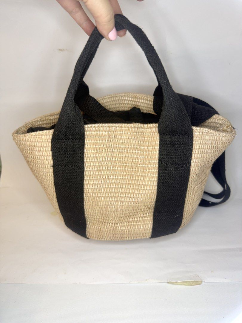 Small Woven Tote Bag (Category: Tote Bags) located in Mandaluyong City. Submitted by cherryspicks (Listing ID 1449913667, Image 1). Description: A small but spacious woven bag great for casual days or the beach. It’s light weight and can stand upright. It has two sets of straps for easy carrying. The inside has a thick pouch. .