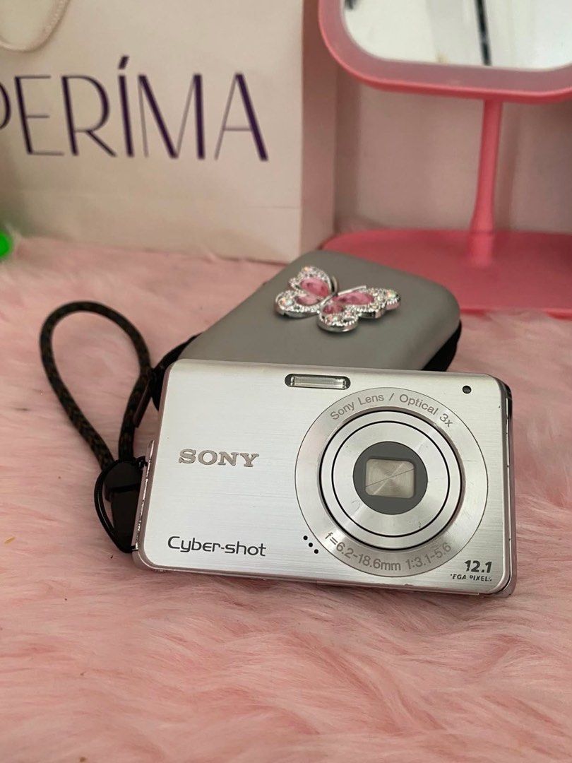 Sony cybershot DSC-W190 silver Digital Camera digicam (Category: Cameras) located in Mandaluyong City. Submitted by zoiyee (Listing ID 1449872282, Image 1). Description: Inclus: Unit, Orig Sony Batt, Orig 8GB Memory Pro Stick Duo, Universal Charger, Wrist Strap & Pouch! • 12MP, 9/10 cosmetics with signs of usage • All functions working.