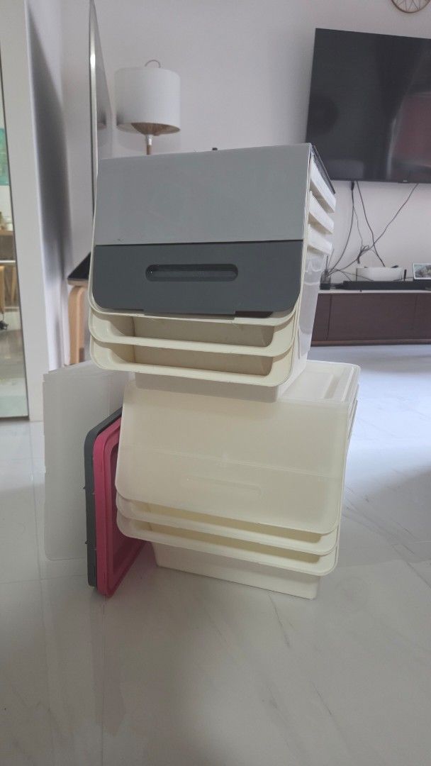 Stackable Storage Containers with Lid (Category: Storage Boxes & Baskets) located in Singapore. Submitted by kopiboyz (Listing ID 1449833639, Image 1). Description: - Set of stackable storage containers - Includes lids - Main container: Grey and white - Inner containers: Cream colored - Ideal for organizing your space - Measurements provided in photos - Feel free to ask any questions.