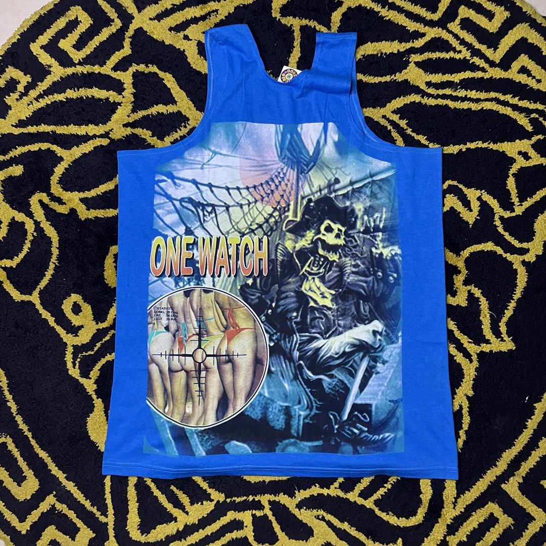 Studio 2000 Blue Graphic Tank Top (Category: Sleeveless) located in Quezon City. Submitted by yeahsource222 (Listing ID 1449869204, Image 2). Description: - Brand: Studio 2000 - Color: Blue - Design: Bold graphic print featuring a skeleton and target motif - Style: Unique, great for casual wear.