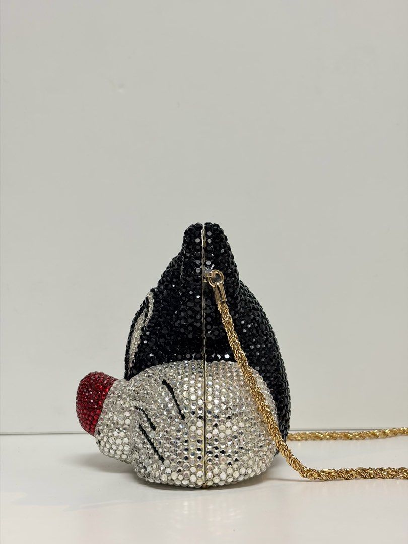 Sylvester the Cat Rhinestone Clutch Bag (Category: Clutches) located in Makati City. Submitted by chumamba (Listing ID 1449950239, Image 3). Description: - Super cute Sylvester the Cat clutch bag - Covered in sparkly rhinestones - Features a red nose detail - Includes a gold chain strap - Ideal for parties or a fun night out - A unique statement piece.