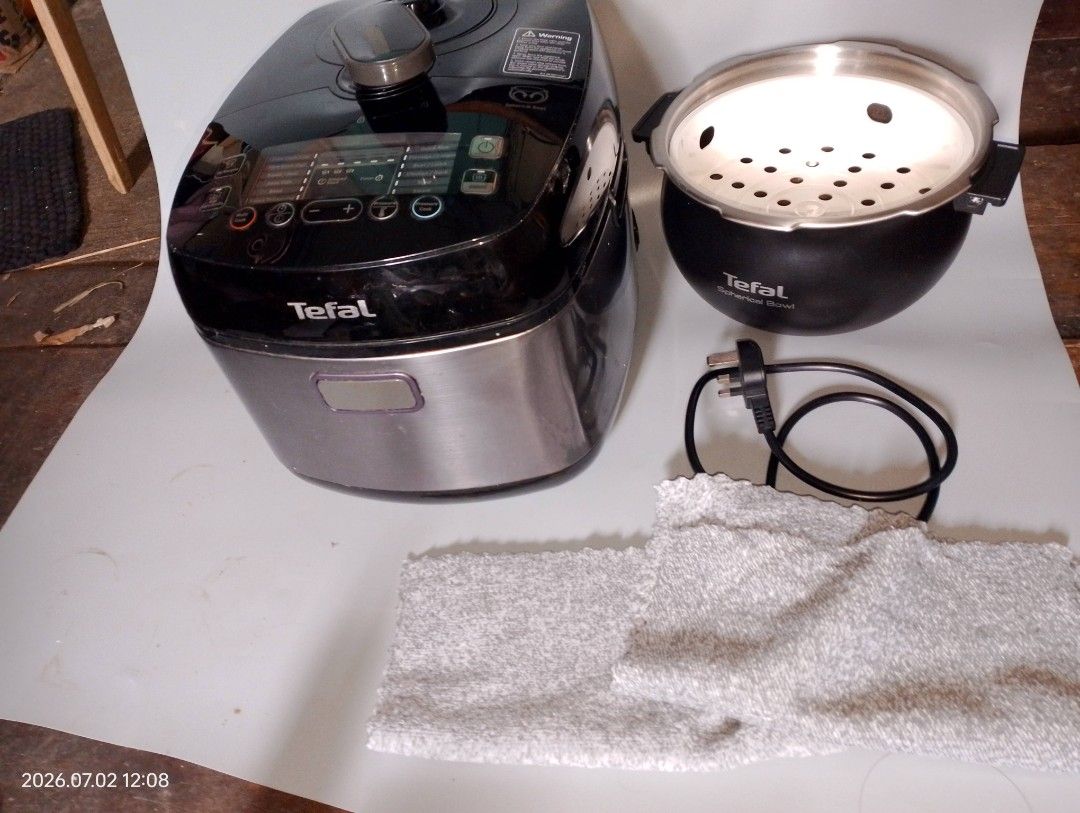 Tefal Multi Cooker with Steamer Basket and Accessories (Category: Cookers) located in Manila. Submitted by rjndilan24053 (Listing ID 1449836612, Image 2). Description: - Tefal Multi Cooker - Versatile cooking functions: rice, porridge, steam, and more - Ideal for busy kitchens - Easy-to-use controls - Includes: inner pot, steamer basket, power cord - Ask me if you have questions!.