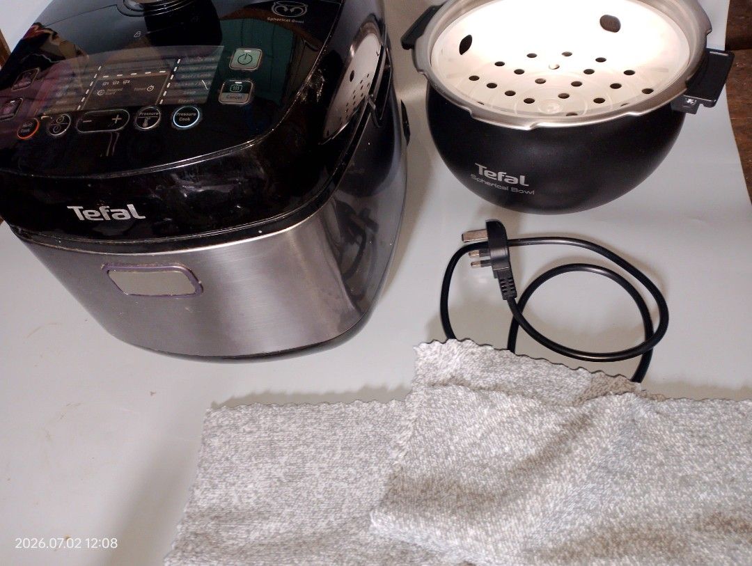 Tefal Multi Cooker with Steamer Basket and Accessories (Category: Cookers) located in Manila. Submitted by rjndilan24053 (Listing ID 1449836612, Image 1). Description: - Tefal Multi Cooker - Versatile cooking functions: rice, porridge, steam, and more - Ideal for busy kitchens - Easy-to-use controls - Includes: inner pot, steamer basket, power cord - Ask me if you have questions!.