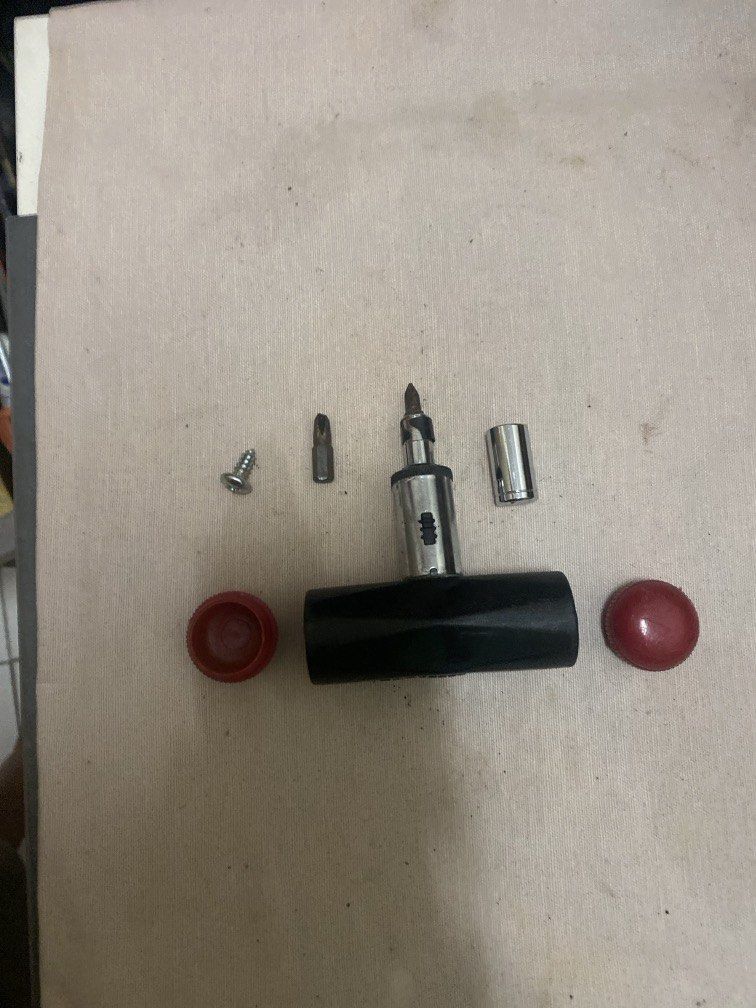 T-Handle Ratcheting Screwdriver with Bits and Socket (Category: Home Improvement Tools & Accessories) located in Petaling Jaya. Submitted by clarencey96769 (Listing ID 1449950449, Image 1). Description: - T-handle ratcheting screwdriver for quick jobs - Comfortable black handle with red end caps - Includes assorted screwdriver bits - Comes with a socket adapter - Easy to grip and use for household tasks.
