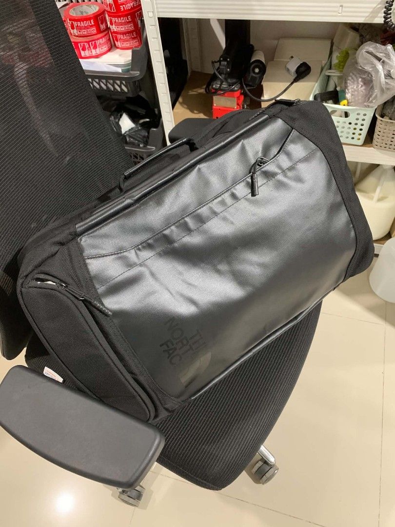 The North Face Refractor Duffel Pack (Category: Backpacks) located in Vigan. Submitted by wiggy_10 (Listing ID 1449763040, Image 2). Description: - Brand: The North Face - Color: Black - Versatile: Can be used as a backpack or duffel bag - Features: Multiple compartments for organization - Comfort: Padded straps for comfortable carrying - Ideal for: Travel, daily commute, or school - Condition: Clean and ready for a new owner.