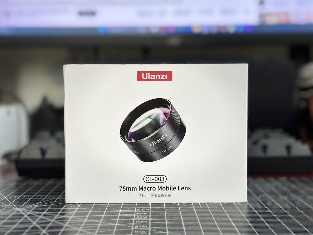 Ulanzi CL-003 75mm Macro Mobile Lens (Category: Lens & Kits) located in Manila. Submitted by eidrienm61275 (Listing ID 1449787449, Image 1). Description: - Ulanzi 75mm Macro Lens (Model CL-003) - Ideal for capturing intricate close-up shots with your smartphone - Comes with a protective case for secure storage - Includes a lens cap to keep the lens clean - All components fit neatly in the case, making it highly portable - Only used ONCE RFS - Not