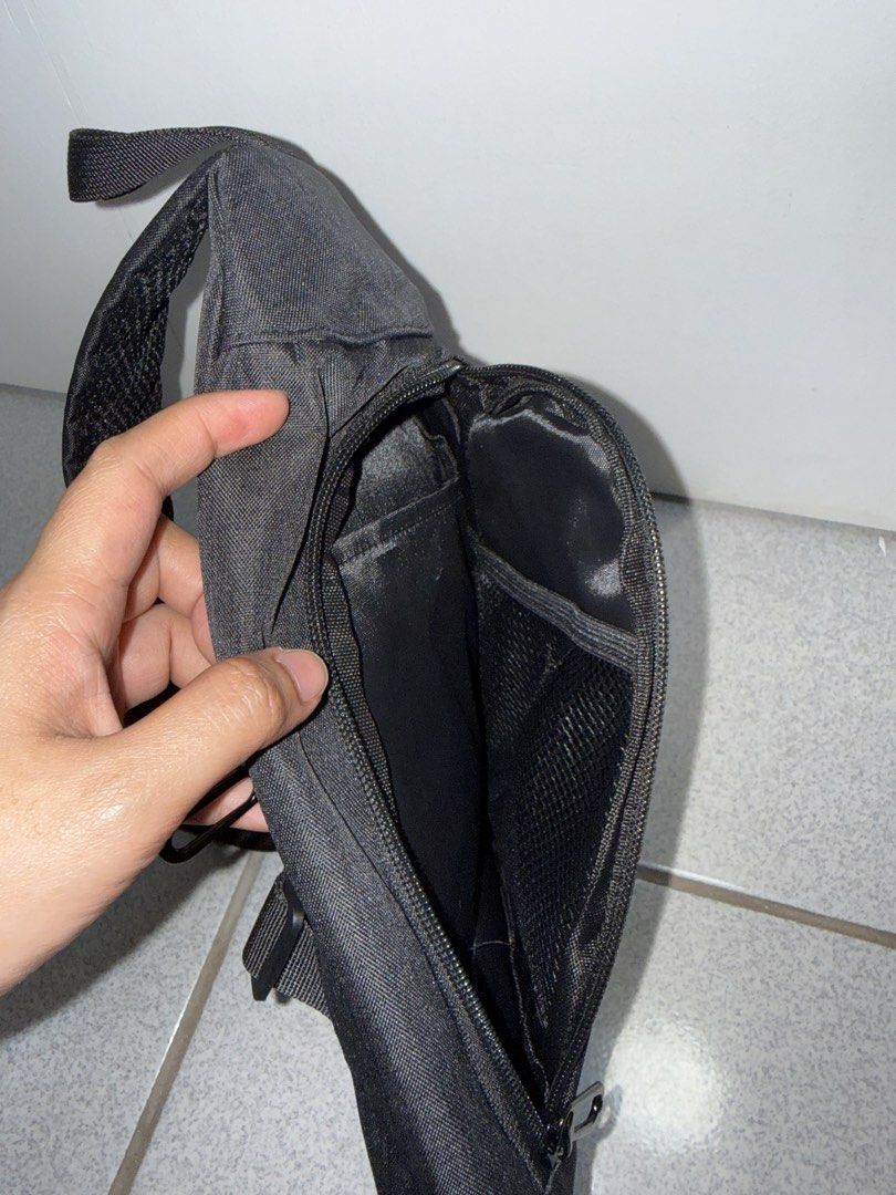 Unbranded Black Sling Bag (Category: Sling Bags) located in San Jose del Monte. Submitted by hellocutease (Listing ID 1449774641, Image 3). Description: 290x230x50cm - Main zippered compartment with internal pockets for organization - Adjustable strap with buckle for a customized fit .