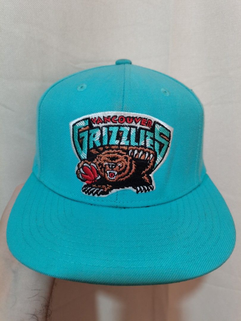 Vancouver Grizzlies Mitchell and Ness Cap (Category: Caps & Hats) located in General Santos City (Dadiangas). Submitted by capitenyo (Listing ID 1449754445, Image 1). Description: Original Vancouver Grizzlies Mitchell & Ness Cap - 2016 Realeased Date - Adjustable Snapback - Flat/Squared Shape Brim/Visor - Green Under Brim/Visor Size - One size Fits Most Materials - Wool / Acrylic Color rate - 9/10, Condition - Used, Good, Excellent JNT door to do