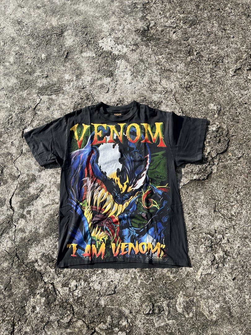 Vintage 1990s Marvel Venom Single Stitch Tee (Category: Tshirts & Polo Shirts ) located in Antipolo. Submitted by redlineregimentsupply (Listing ID 1449846044, Image 1). Description: 🏷️Vintage 1990s / Changes Tag / Made in USA Tagged Size: L (Classic Boxy Fit) 📏 Actual Measurements: • Chest Width: 21 inches • Shoulder Width: 19 inches • Length: 28 inches • Sleeve Length: 9 inches This Venom T-shirt is a true vintage piece from the 1990s Marvel 