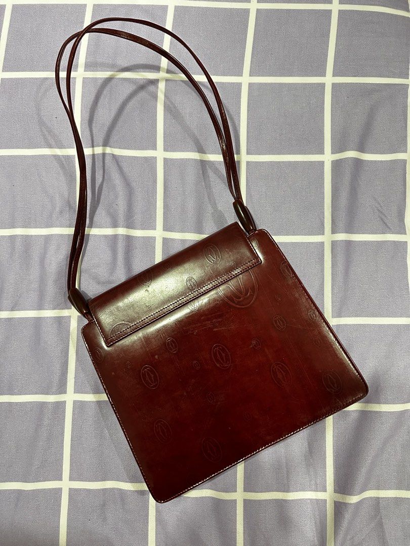 Vintage Cartier (Category: Luxury Bags & Wallets) located in Navotas City. Submitted by minaly_ (Listing ID 1449924001, Image 3). Description: Vintage Cartier Shoulder Bag Burgundy Leather Dual Shoulder Straps Single Exterior Pocket Logo Jacquard Lining & Single Interior Pocket Turn-Lock Closure at Front Dm me for the price Super nice in person! 100% guaranteed authentic.