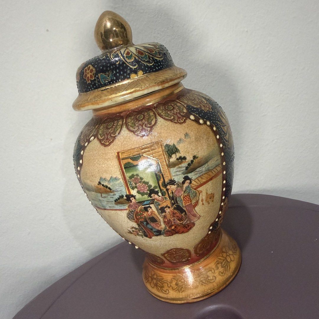 Vintage Ceramic Ginger Jar with Lid, Oriental Scene (Category: Vases & Decorative Bowls) located in Petaling Jaya. Submitted by ohor83 (Listing ID 1449914126, Image 3). Description: Beautiful Royal satsuma (made in China) vintage ceramic ginger jar with a lid. Features a detailed oriental scene with figures and landscapes. The body has a crackled glaze finish. Accented with gold trim and floral patterns. Great for home decor or as a statement pie