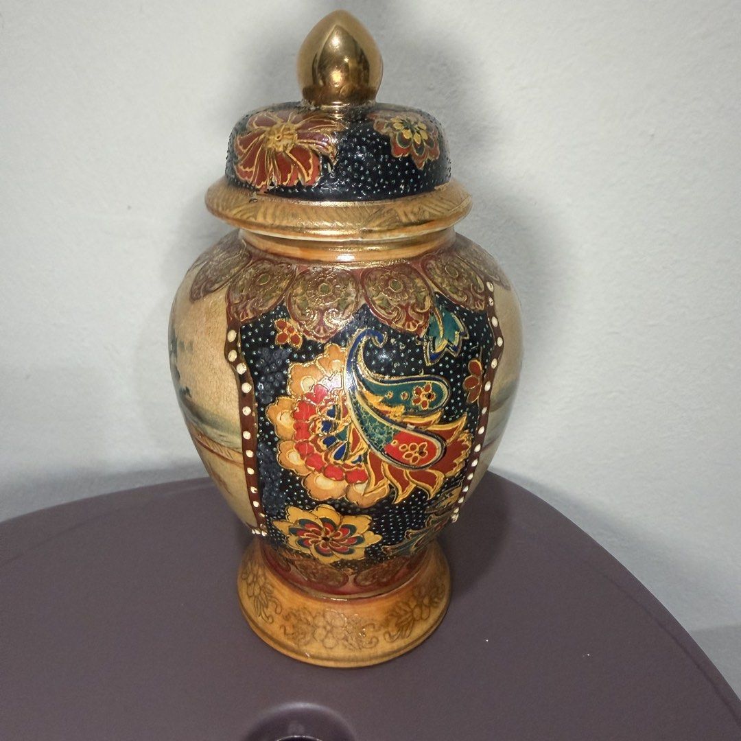 Vintage Ceramic Ginger Jar with Lid, Oriental Scene (Category: Vases & Decorative Bowls) located in Petaling Jaya. Submitted by ohor83 (Listing ID 1449914126, Image 2). Description: Beautiful Royal satsuma (made in China) vintage ceramic ginger jar with a lid. Features a detailed oriental scene with figures and landscapes. The body has a crackled glaze finish. Accented with gold trim and floral patterns. Great for home decor or as a statement pie
