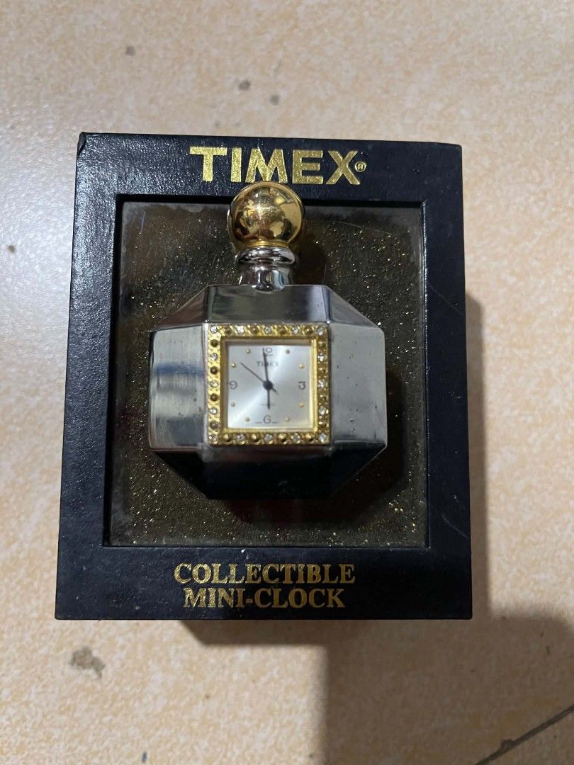 Vintage mini clock timex (Category: Men's Watches) located in Quezon City. Submitted by mhond-ray192512 (Listing ID 1449784844, Image 1). Description: FOR SALE: VINTAGE COLLECTIBLE TIMEX MINI CLOCK RHINSTONE BEZEL DESIGNED IN THE SHAPE OF PERFUME BOTTLE UNUSED, MODEL-TMX 203. PM TO THOSE INTERESTED 💌👌 LOC. COMM QC.
