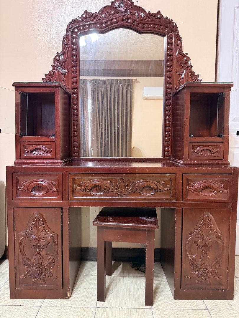 Vintage NARRA Dressing Table with Mirror and Stool (Category: Tables & Sets) located in Las Pinas. Submitted by happyluv0302 (Listing ID 1449834502, Image 1). Description: - Vintage Narra wooden dressing table - Large ornate mirror included - Matching stool included - Plenty of drawers and cabinets for storage - Rich, dark wood finish - Classic design suits various bedroom styles - Ideal for organizing makeup and accessories 🔹pick up by buyer 🔹