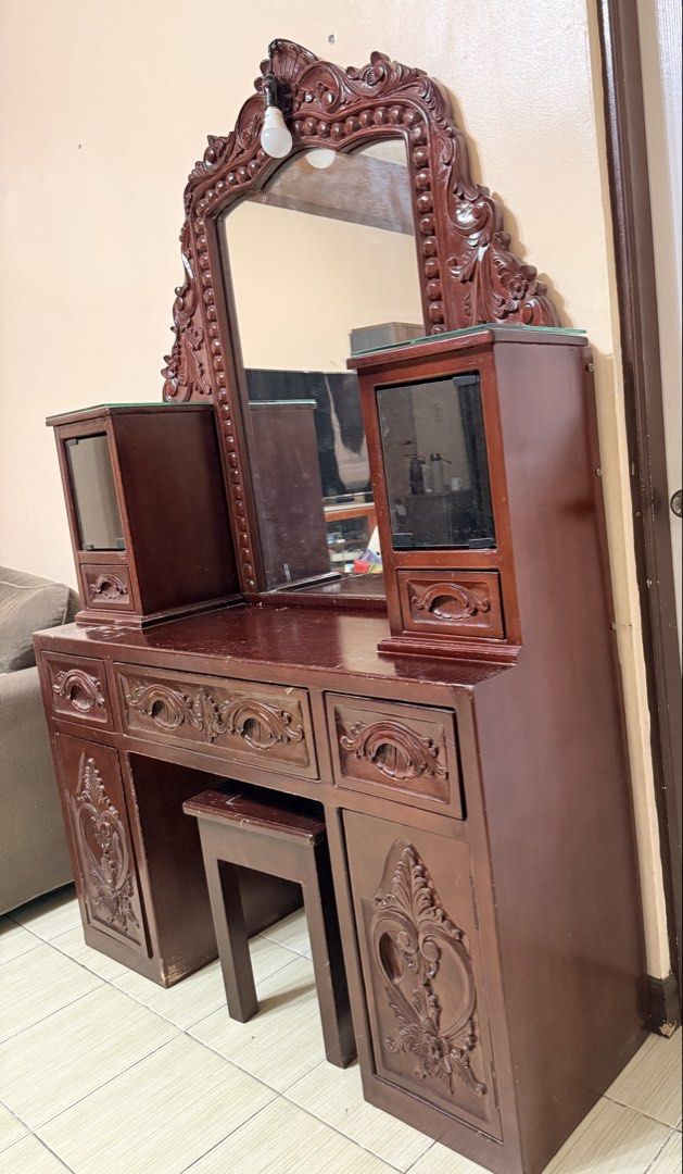 Vintage NARRA Dressing Table with Mirror and Stool (Category: Tables & Sets) located in Las Pinas. Submitted by happyluv0302 (Listing ID 1449834502, Image 3). Description: - Vintage Narra wooden dressing table - Large ornate mirror included - Matching stool included - Plenty of drawers and cabinets for storage - Rich, dark wood finish - Classic design suits various bedroom styles - Ideal for organizing makeup and accessories 🔹pick up by buyer 🔹