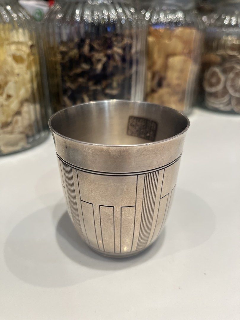 Vintage Silver Cup with Geometric Design (Category: Coffee & Tea Tableware) located in Iloilo. Submitted by yangfire (Listing ID 1449864084, Image 1). Description: - Unique vintage cup - Features an etched geometric pattern - Smooth and clean interior - Maker's mark possibly present on the bottom - Substantial, nice weight - Ideal for collectors or as a decorative accent what you see in the picture is what u can get.
