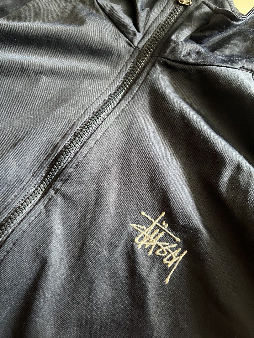 Vintage Stussy Track Jacket (Category: Coats, Jackets and Outerwear) located in Santa Ana. Submitted by rlave (Listing ID 1449877468, Image 2). Description: Preloved vintage Stüssy track jacket, sourced from a trusted supplier. Features the classic Stüssy branding/logo, retro track jacket silhouette, full-zip closure, and a laid-back streetwear fit — a solid pick for collectors or everyday wear. Item is in good preloved condition with the charact