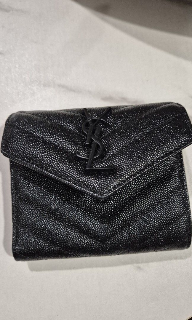 YSL Envelope Monogram Trifold Wallet (Category: Wallets & Card holders) located in Makati City. Submitted by nixxtann_turtle (Listing ID 1449907259, Image 2). Description: YSL Envelope Monogram Trifold Wallet featuring black Grain de Poudre leather and matte black hardware. Disclaimer: Not original..