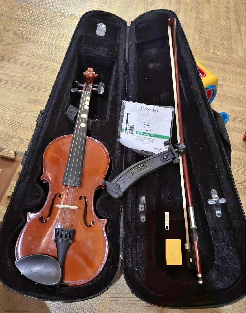 1/4 Size Violin with Case, Bow, and Pirastro Strings (Category: Musical Instruments) located in Manila. Submitted by thrifty_cool (Listing ID 1450085012, Image 1). Description: - 1/4 size violin - Complete starter set for young musicians - Includes: case, bow, shoulder rest, rosin - Brand new set of Pirastro Chromcor strings installed - Ready to play out of the box.