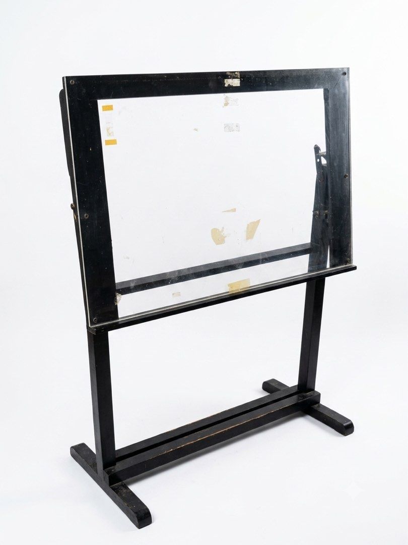 24”x36” Drawing Table (Category: Tables & Sets) located in Lapu Lapu. Submitted by myprelovedpile (Listing ID 1450076927, Image 1). Description: - Material: Wood and acrylic glass - Bought around 2020 for ₱4,000. - Still sturdy and adjustable. - Has some tape marks from use. - Noticed a slight alignment issue when drawing straight 180° lines — could be from the T-square or table edge (not sure). - Great for art, sketching, or general drafting. .