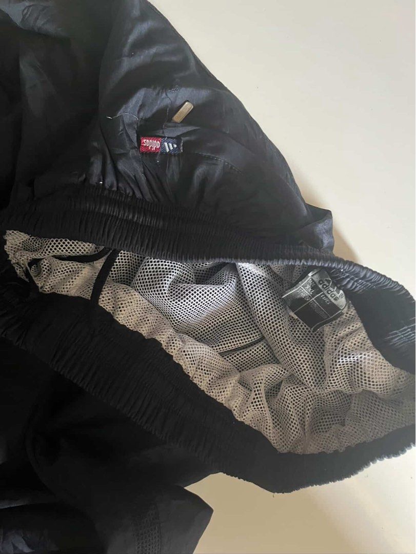 Adidas Baggy Track Pants (Category: Jeans) located in Santa Ana. Submitted by rlave (Listing ID 1449989283, Image 3). Description: Preloved Adidas baggy track pants, featuring a breathable mesh inner lining for added comfort and airflow. Classic Adidas 3-Stripes branding, relaxed baggy fit, elastic waistband — great for training, streetwear looks, or everyday casual wear. Item is in good preloved condition (see photos for actual item, including c