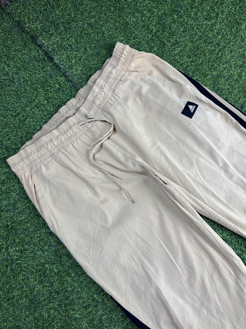 Adidas Nylon Jogging Pants (Category: Joggers) located in Calapan. Submitted by seria_thrifting_apparel (Listing ID 1449984321, Image 2). Description: ✅Complete Tags / Lightweight • Width: 37-44 • Length: 41.5 • Hem: 7 • Color rate: 9.5/10 • Issue: None (Excellent Condition).