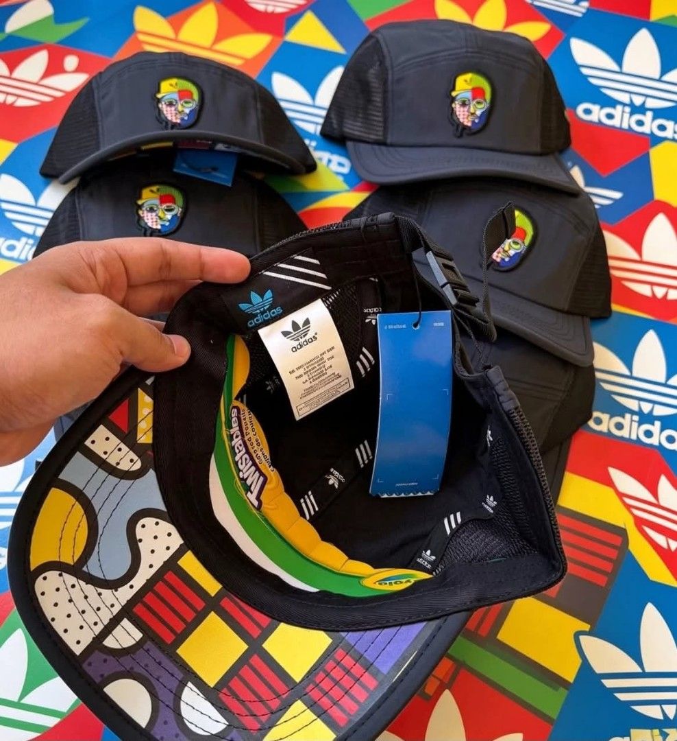 Adidas x K.O.L. Artist Collaboration 5-Panel Cap (Category: Caps & Hats) located in Manila. Submitted by jerick_paul.512 (Listing ID 1449999867, Image 2). Description: - Special Adidas artist collaboration cap - Unique embroidered portrait on the front - Breathable mesh sides - Adjustable strap for a comfortable fit - Interior lining with a colorful, abstract pattern - Adds flair to any outfit.