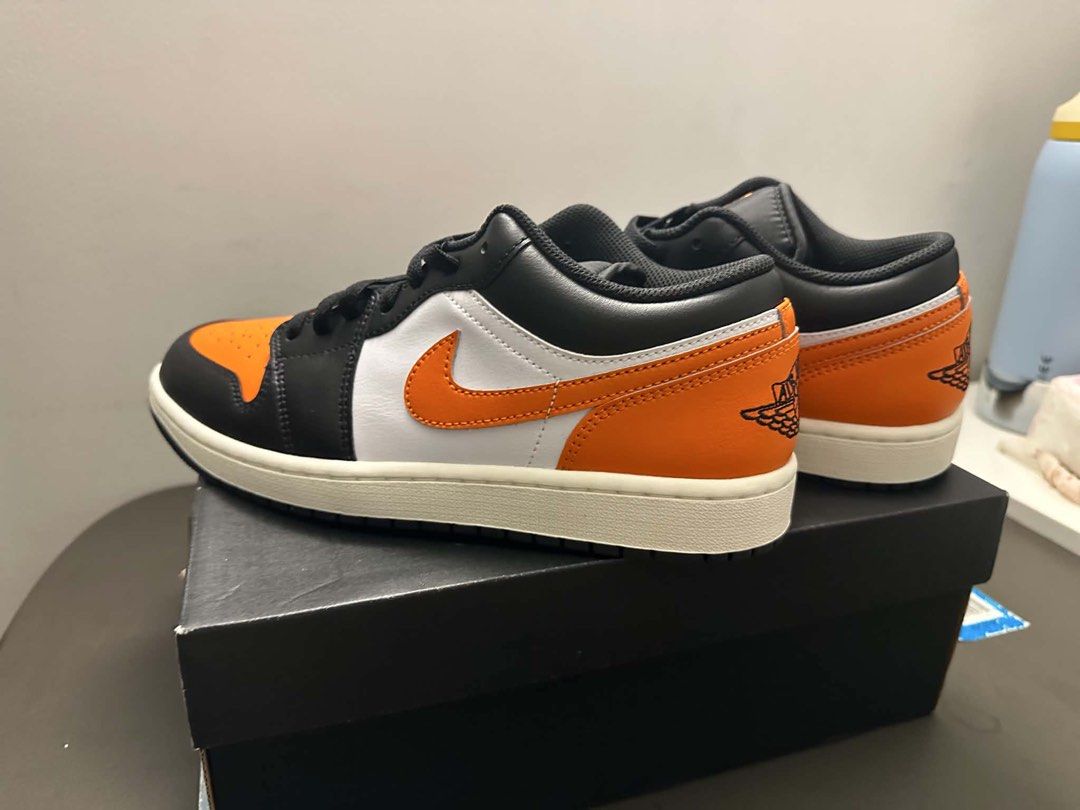 Air Jordan 1 Low "Shattered Backboard" (Category: Sneakers) located in Cabuyao City. Submitted by vladimyrkyle (Listing ID 1450108751, Image 3). Description: - Authentic (from Dubai) - Never been used - Classic Air Jordan 1 Low - Popular Shattered Backboard colorway - Black, white, and orange leather - Clean and ready for a new owner - Comes with original box - Iconic and stylish kicks RFS: wrong size.