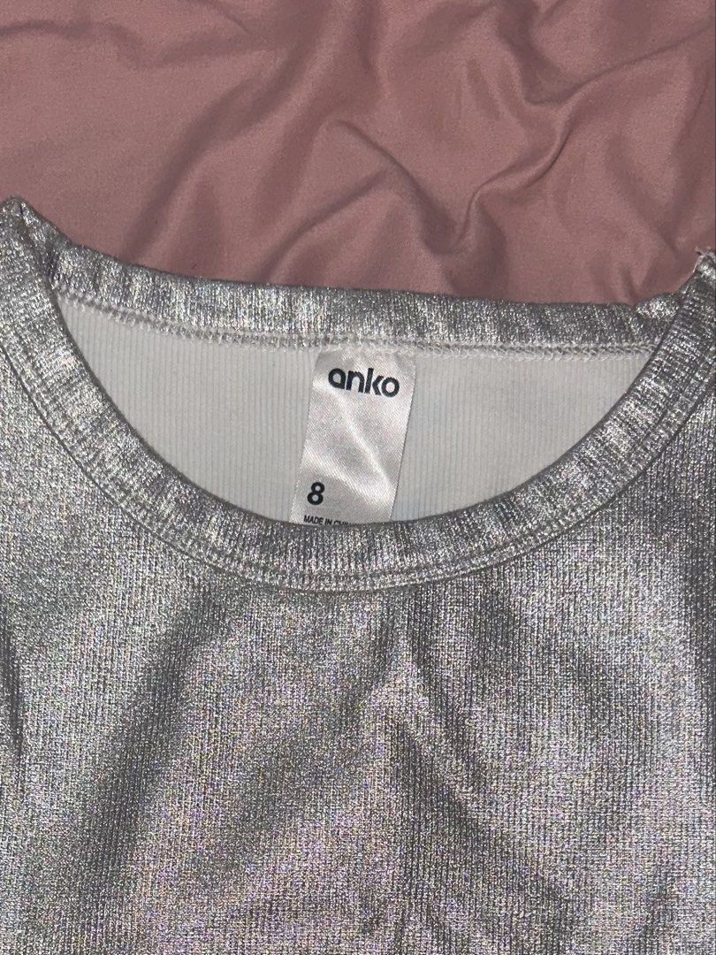 Anko Silver Tank Crop Top (Category: Sleeveless) located in Quezon City. Submitted by _jasminkae (Listing ID 1450071544, Image 2). Description: • Bought from Anko in Melbourne • Never used (i have grown out of crop tops) • Metallic silver color, perfect for night outs!.