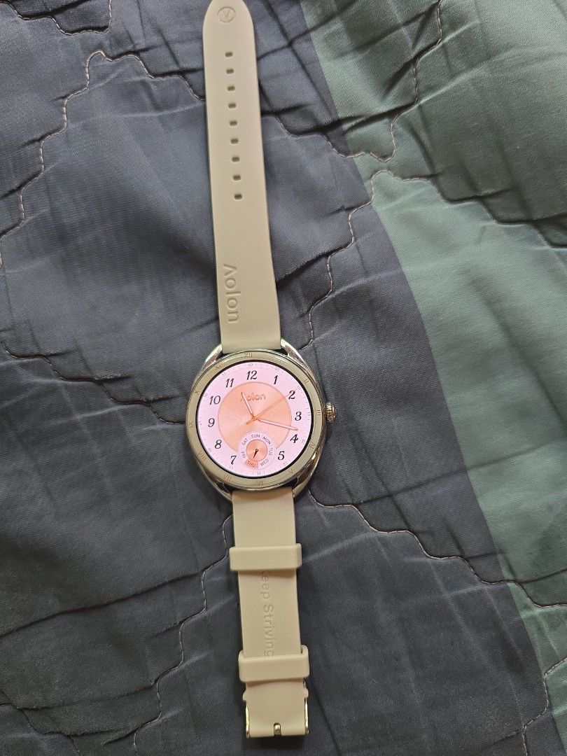Aolon Nova Smartwatch with White Strap (Category: Wearables & Smart Watches) located in Balamban. Submitted by macabebe (Listing ID 1449976114, Image 2). Description: - Brand: Aolon Smartwatch - Color: white silver watch face with white strap - Shape: Round - Features: Tracks your day - Condition: Works well bought at orange app RFS: school does not allow smartwatch will go back to manual watch.
