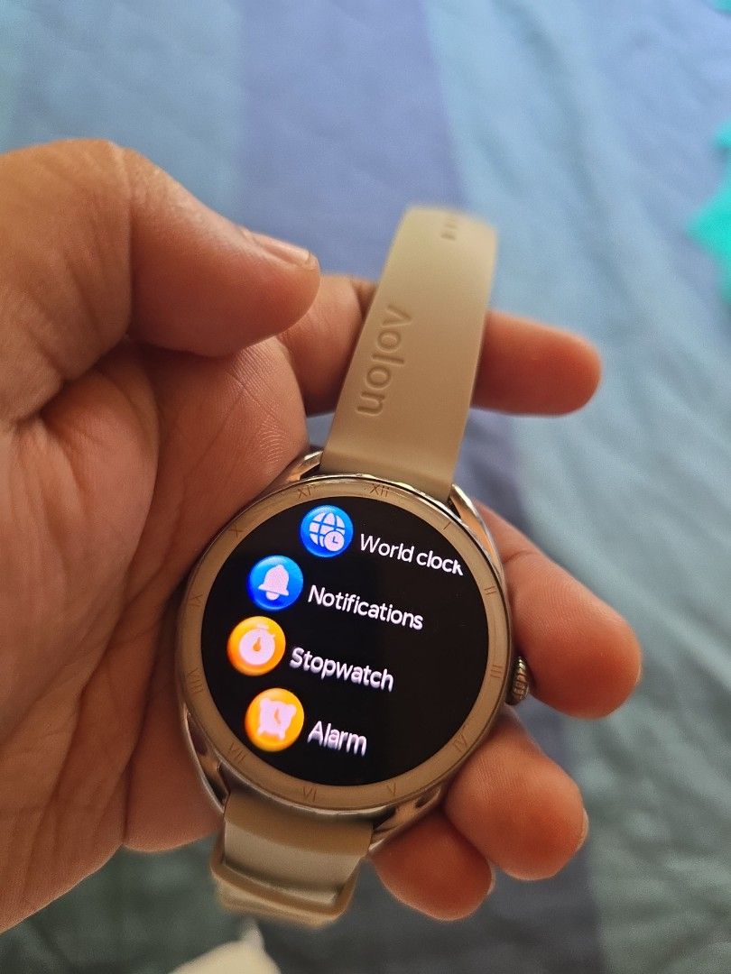 Aolon Nova Smartwatch with White Strap (Category: Wearables & Smart Watches) located in Balamban. Submitted by macabebe (Listing ID 1449976114, Image 3). Description: - Brand: Aolon Smartwatch - Color: white silver watch face with white strap - Shape: Round - Features: Tracks your day - Condition: Works well bought at orange app RFS: school does not allow smartwatch will go back to manual watch.