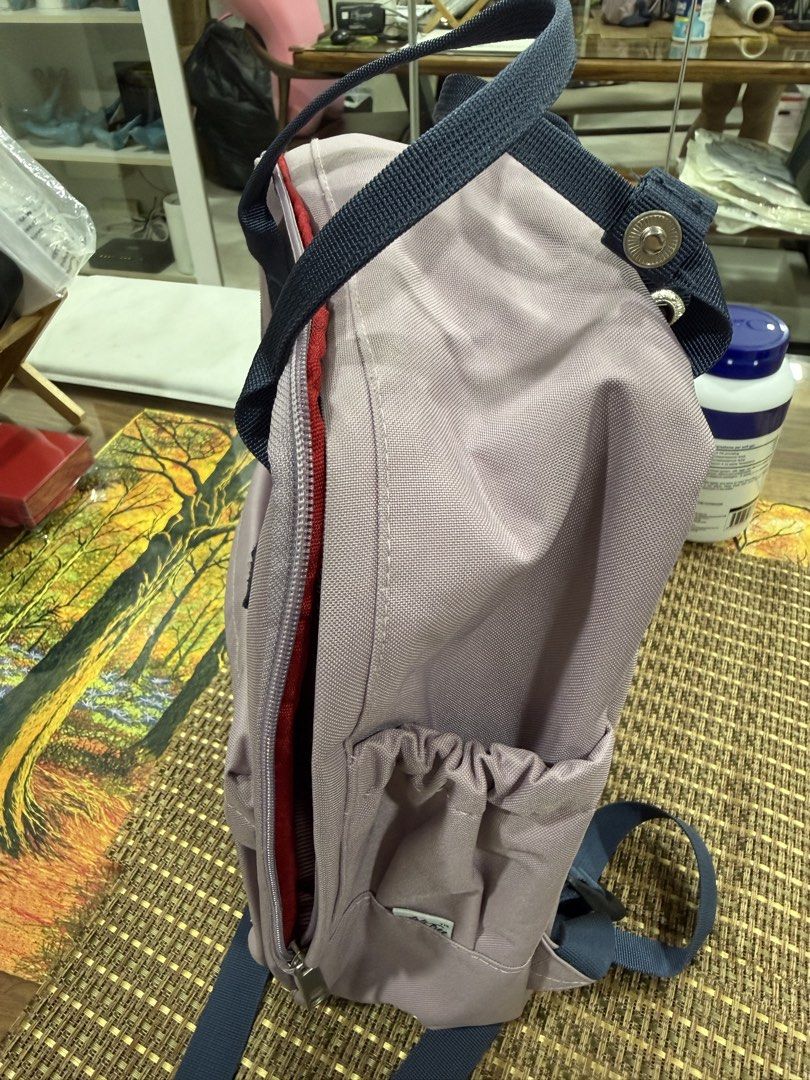 Ash Tree Backpack - Lavender (Category: Backpacks) located in Singapore. Submitted by younghawk-ea1f (Listing ID 1450119921, Image 2). Description: - Ash & Elm lavender backpack - Front zip pocket - Side pockets - Red and white striped interior lining all clean - Adjustable shoulder straps - Ideal for everyday use.