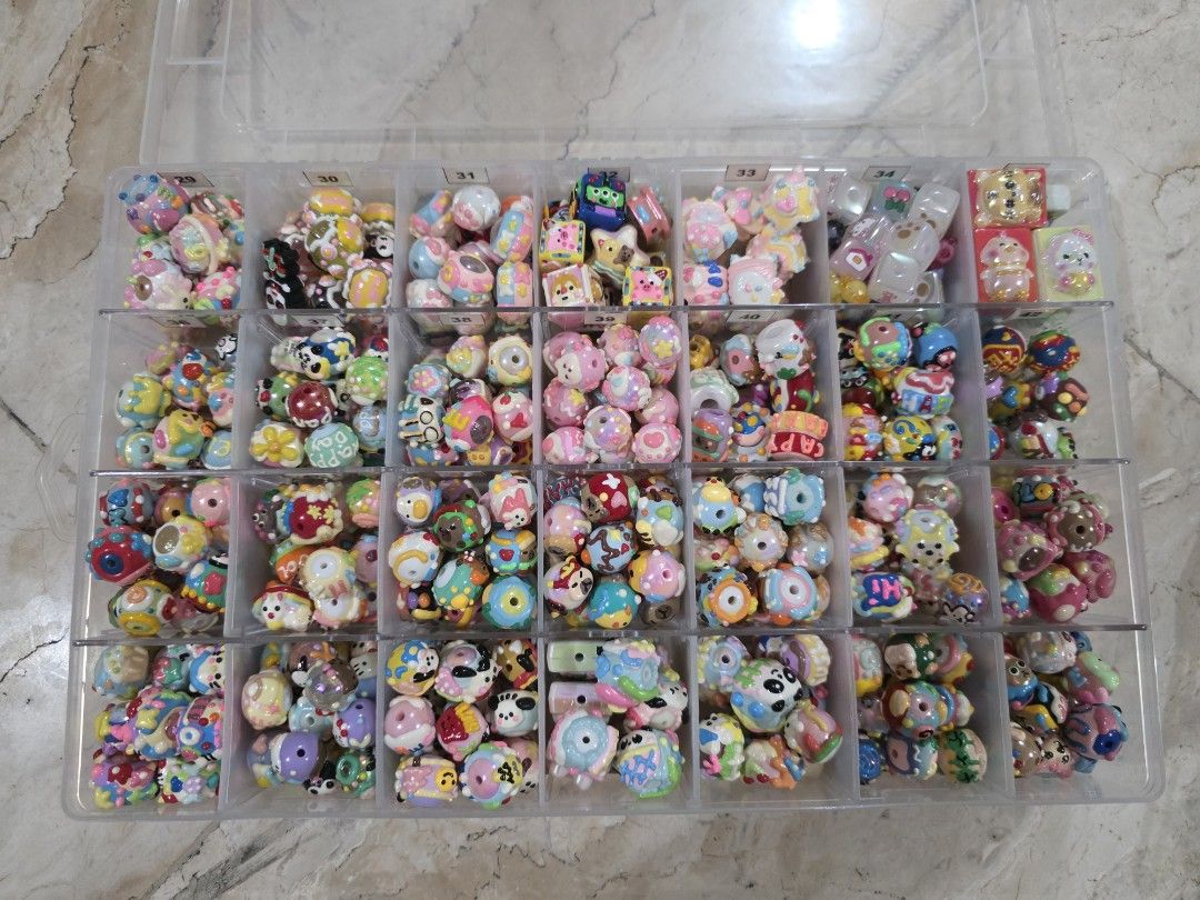 Assorted Painted Beads and Others with Storage Box (Category: Craft Supplies & Tools) located in Paranaque City. Submitted by tangerinedayz (Listing ID 1450070248, Image 1). Description: Includes: Bear, Disney, Toy Story, Panda, Bunny, Penguin, Crayon Shin-Chan, Capybara, Sanrio, Hello Kitty, Kuromi, Pochaco, Panda, and others Water Beads, Square Beads, and Animal Zodiac Bead Sold AS IS condition. What you see is what you get..