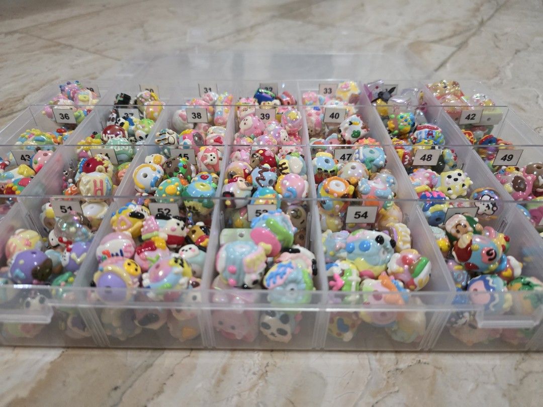 Assorted Painted Beads and Others with Storage Box (Category: Craft Supplies & Tools) located in Paranaque City. Submitted by tangerinedayz (Listing ID 1450070248, Image 2). Description: Includes: Bear, Disney, Toy Story, Panda, Bunny, Penguin, Crayon Shin-Chan, Capybara, Sanrio, Hello Kitty, Kuromi, Pochaco, Panda, and others Water Beads, Square Beads, and Animal Zodiac Bead Sold AS IS condition. What you see is what you get..