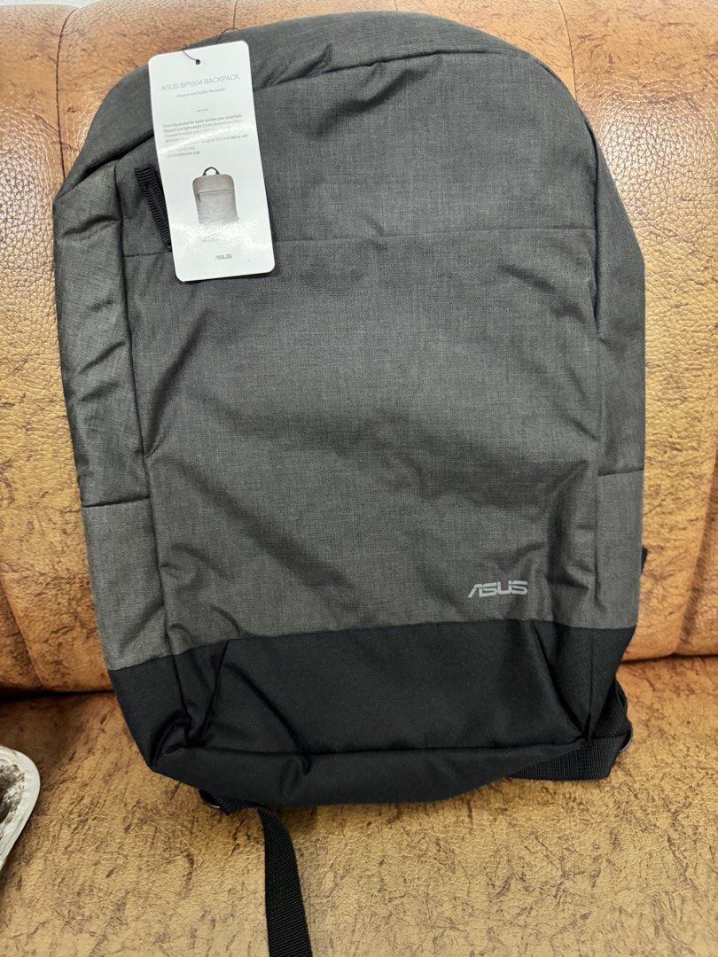 ASUS Laptop Backpack Grey (Category: Backpacks) located in Manila. Submitted by brentschyl38066 (Listing ID 1450112568, Image 2). Description: - Grey ASUS backpack - Ideal for school or work - Padded straps for comfort - Spacious interior, fits a laptop - Brand new, still in original packaging.