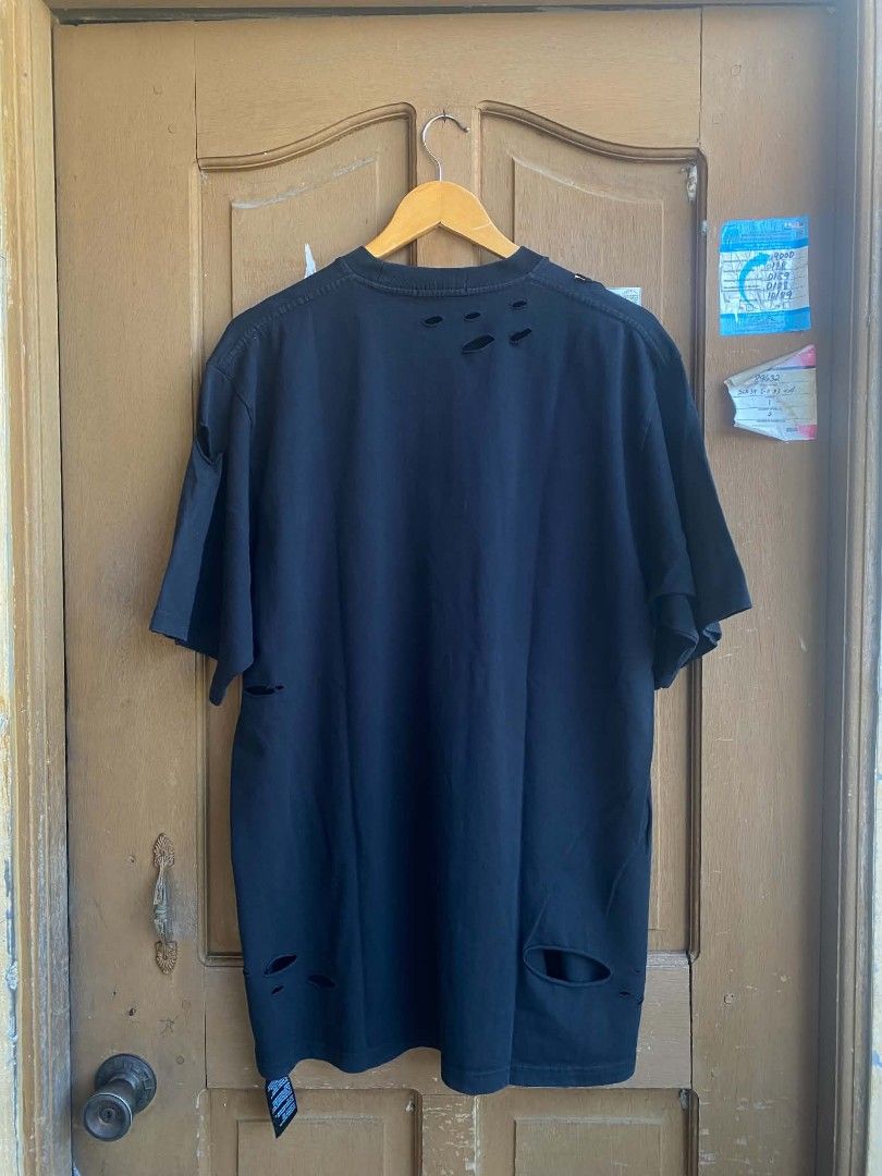 Balenciaga logo oversized distressed shirt black (Category: Luxury Apparel) located in Cabuyao City. Submitted by PHdowner30 (Listing ID 1449969270, Image 2). Description: FOR SALE ONLY Balenciaga logo oversized distressed shirt black Size: M ( 24x31 ) Excellent condition Complete tags P600 + SF negotiable Pm.