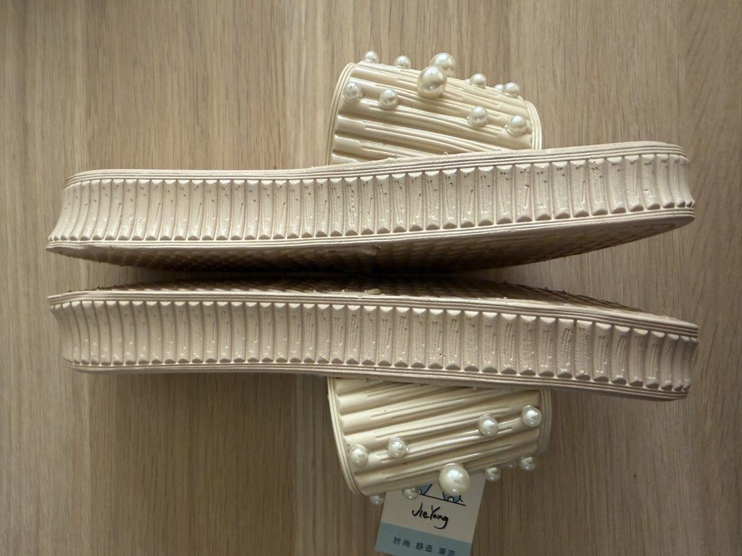 Beige sandals with pearls (Category: Sandals) located in Makati City. Submitted by declutterwithella (Listing ID 1450048324, Image 2). Description: Brand new Bought from orange app Beige Size 37 on tag but for me this best fits 6-6.5 only Location: Bangkal, Makati.