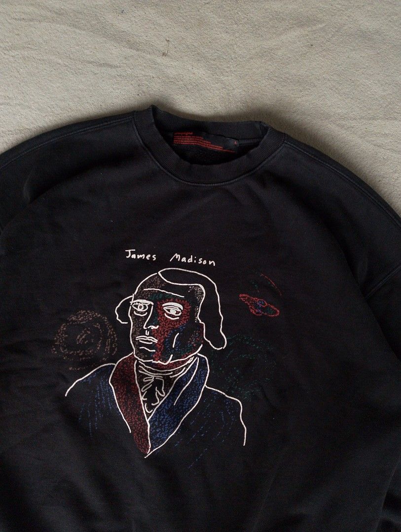 Black James Madison Graphic Sweatshirt (Category: Coats, Jackets and Outerwear) located in Caloocan City. Submitted by sharpthreads18 (Listing ID 1449976407, Image 2). Description: ‎________________ ‎📏DIMES (INCHES) ‎Length: 28 ‎Width: 28 ‎________________ ‎🧷DETAILS ‎Issue: none ‎Condition: Excellent ‎Color rate: 10/10.