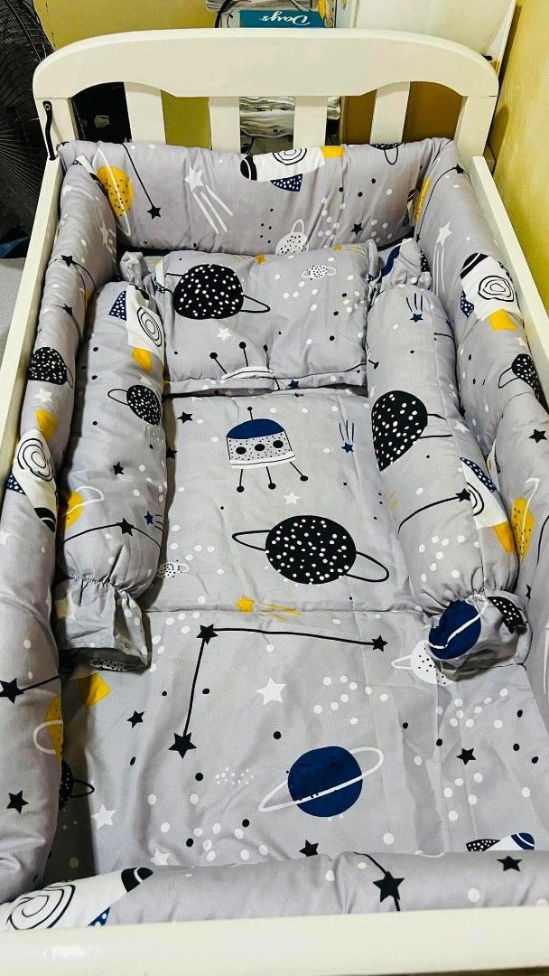 Bloom Baby Crib Bedding Set - Space & Rainbow Designs (Category: Cots & Cribs) located in San Jose del Monte. Submitted by urban_sissyshop (Listing ID 1449959653, Image 3). Description: - Two sets of Bloom baby crib bedding available. - Both sets are brand new and still in original packaging. - Set 1: Fun space theme with rockets and planets. - Set 2: Cheerful rainbow and sun design. - Ideal for creating a beautiful nursery. - Special offer: Get 