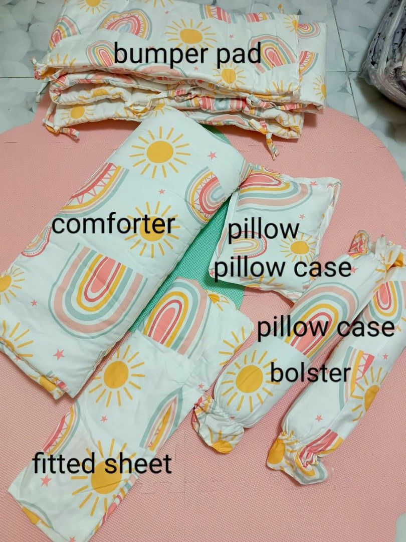 Bloom Baby Crib Bedding Set - Space & Rainbow Designs (Category: Cots & Cribs) located in San Jose del Monte. Submitted by urban_sissyshop (Listing ID 1449959653, Image 2). Description: - Two sets of Bloom baby crib bedding available. - Both sets are brand new and still in original packaging. - Set 1: Fun space theme with rockets and planets. - Set 2: Cheerful rainbow and sun design. - Ideal for creating a beautiful nursery. - Special offer: Get 