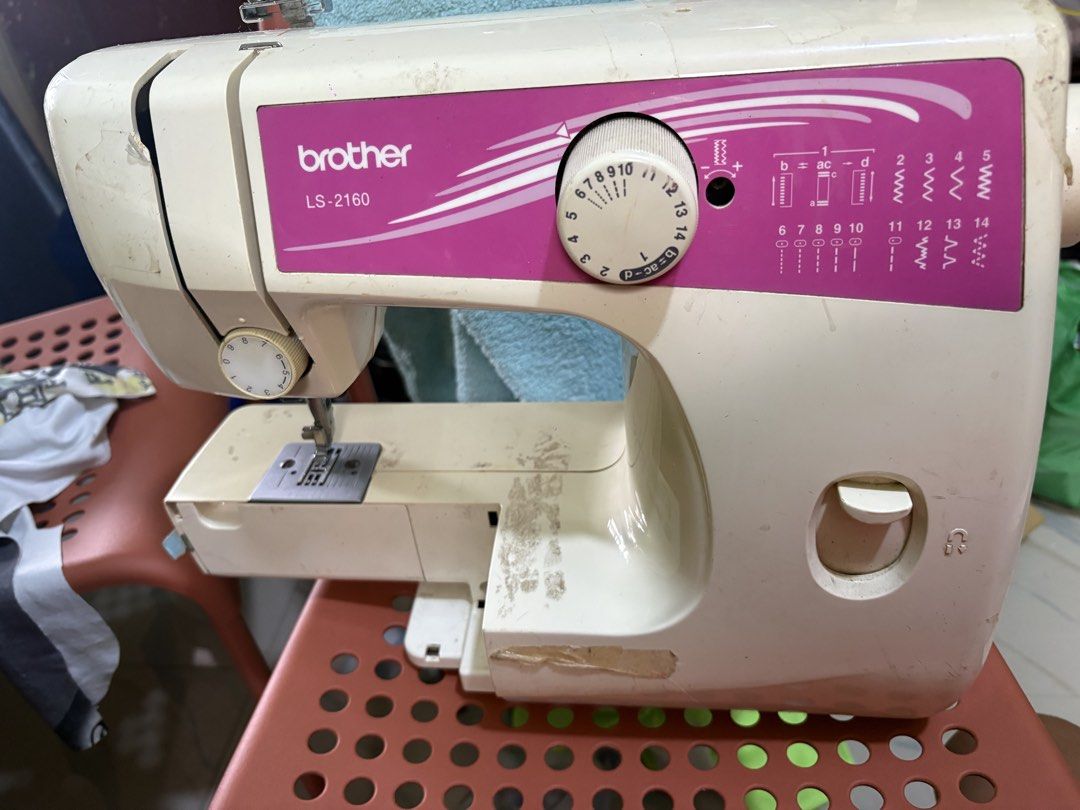 Brother LS-2160 Sewing Machine (Category: Other Home Appliances) located in Las Pinas. Submitted by crafthingz (Listing ID 1449985918, Image 3). Description: - Brother LS-2160 sewing machine - Features multiple stitch patterns - Dial for stitch selection and length adjustment - Fully functional and great for basic sewing projects ISSUE: -BROKEN THREAD TENSION DIAL -FLAT BED ATTACHMENT .