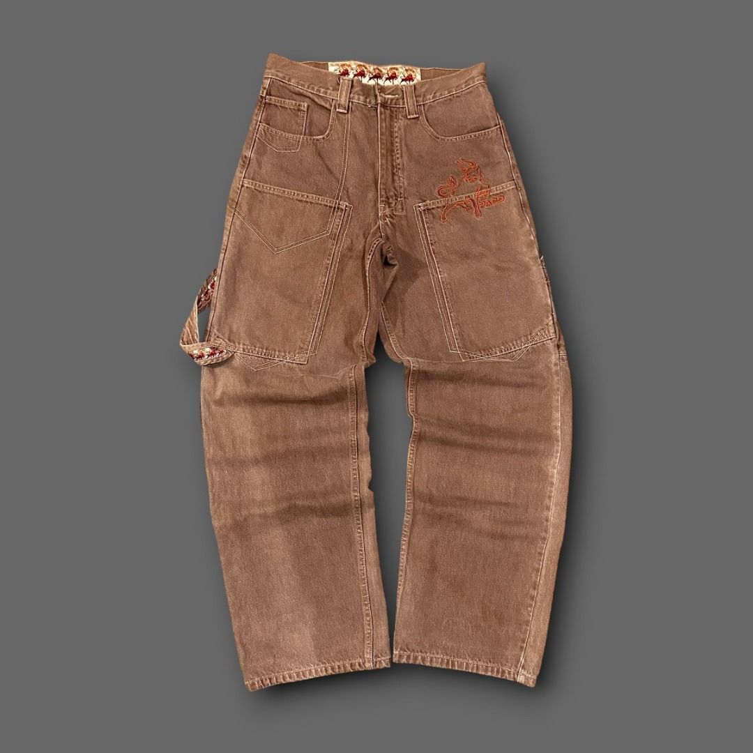 Brown Carpenter Jeans with Orange Embroidery (Category: Jeans) located in Pasig City. Submitted by postrano.harvey (Listing ID 1450031610, Image 1). Description: Vintage Paco Double Knee Pants Waist: 31" Length: 37" Leg opening: 9.5" Condition: 9/10 Color rate: 9/10 Issue: None DM to purchase..