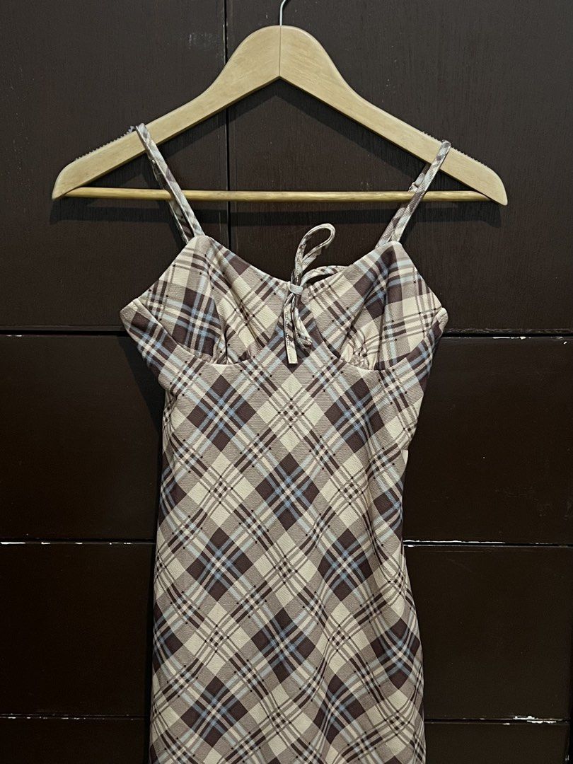 Brown Plaid Mini Dress with Tie Front (Category: Dresses) located in Batangas. Submitted by k8declutters (Listing ID 1450048453, Image 1). Description: - Cute brown plaid mini dress - Features thin spaghetti straps - Tie detail at the bust.