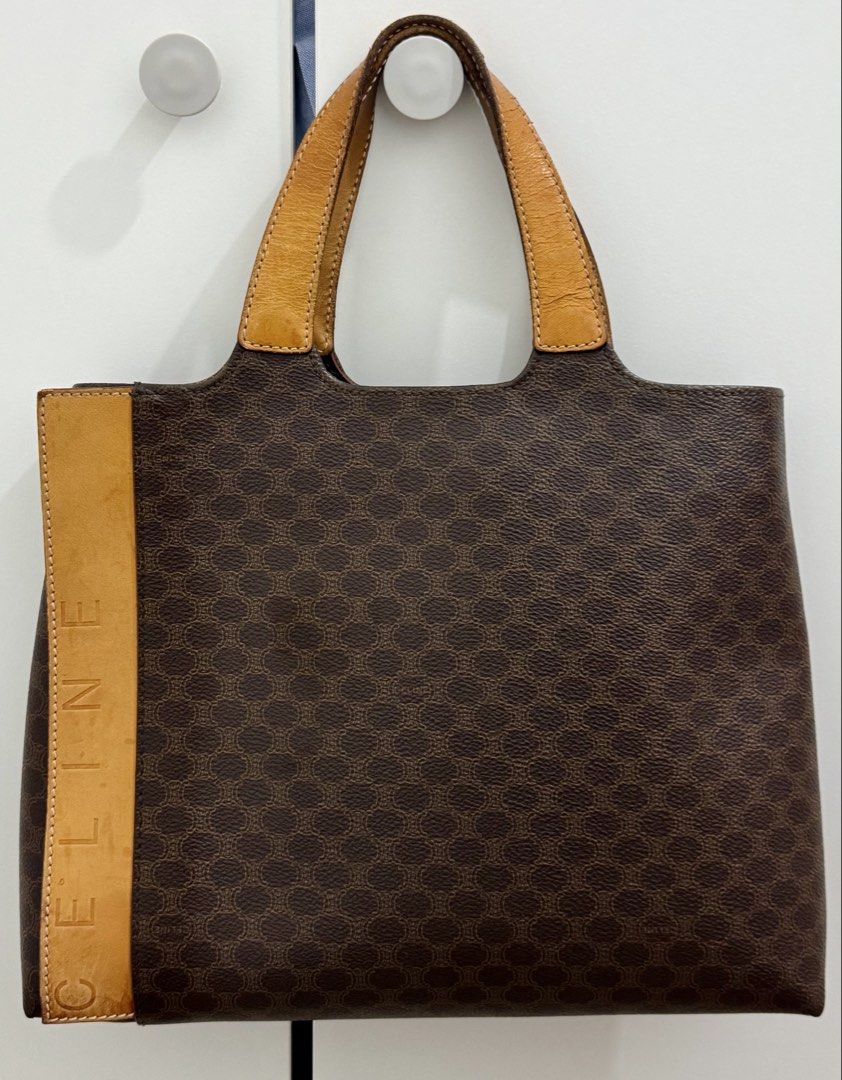 Vintage Celine Macadam Tote Bag (Category: Luxury Bags & Wallets) located in Cavite. Submitted by edendardar07 (Listing ID 1449958836, Image 1). Description: - Classic Celine tote bag - Iconic monogram print - Leather trim and handles - Zipper closure - Interior tag: CE00/15 - Ideal for everyday essentials.